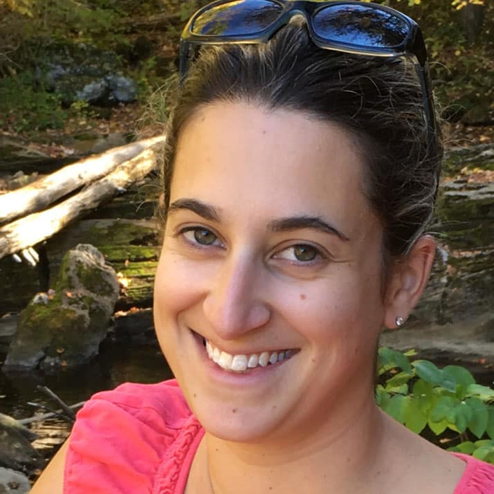Photo of consulting teacher for responsive classroom, Allyson Story, in a scenic forest setting.